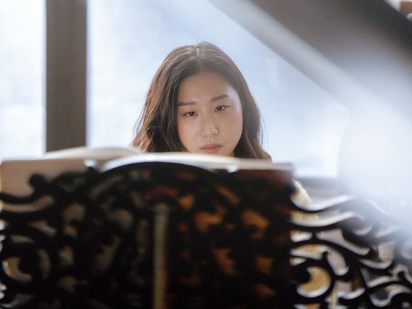 Woman feeling energized and light after a practice session.